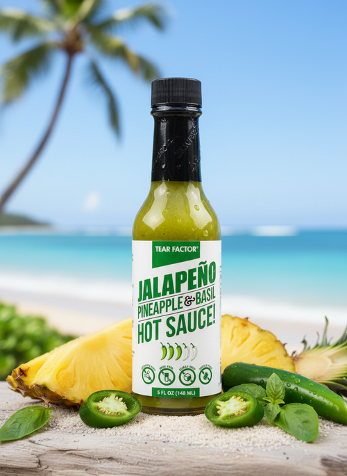 Tear Factor Island Tears Jalapeño Pineapple Basil Hot Sauce in tropical setting